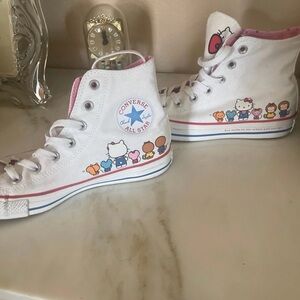 Converse White High Top Sneakers with Pink Trim and Hello Kitty Graphics